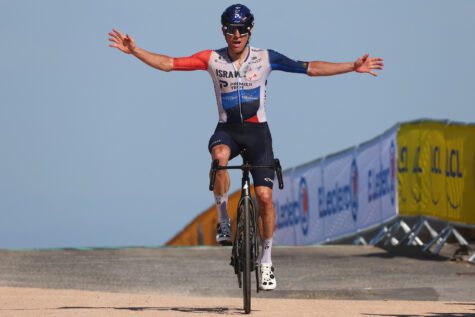 Michael Woods celebrates soloing to win at Puy de Dôme